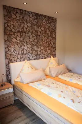Ein Bett oder Betten in einem Zimmer der Unterkunft Hotel Zur Brücke