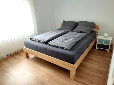 Ein Bett oder Betten in einem Zimmer der Unterkunft Südeifel Badem
