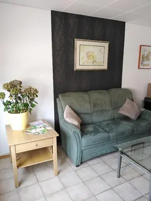 Ein Sitzbereich in der Unterkunft Südeifel Badem