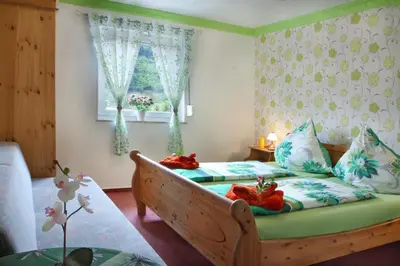 Ein Bett oder Betten in einem Zimmer der Unterkunft Hotel im Rheintal