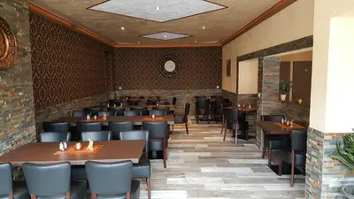 Ein Restaurant oder anderes Speiselokal in der Unterkunft Hotel im Rheintal
