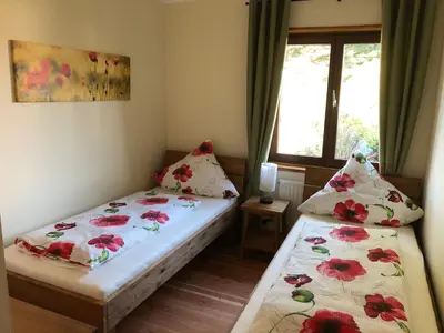 Ein Bett oder Betten in einem Zimmer der Unterkunft Waldhaus-Vulkaneifel