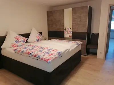 Ein Bett oder Betten in einem Zimmer der Unterkunft Ferienwohnung Valentin