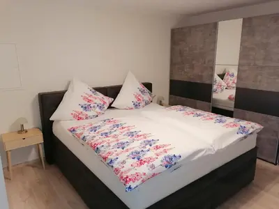 Ein Bett oder Betten in einem Zimmer der Unterkunft Ferienwohnung Valentin