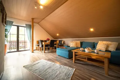 Ein Sitzbereich in der Unterkunft Balkon Zimmer - Apartment
