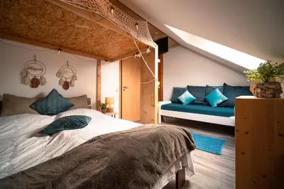 Ein Bett oder Betten in einem Zimmer der Unterkunft Balkon Zimmer - Apartment