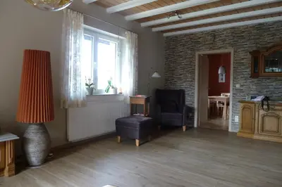 Ein Sitzbereich in der Unterkunft Ferienwohnung Haus Handwerk
