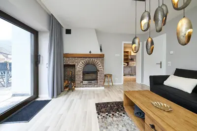 Ein Sitzbereich in der Unterkunft Ferienhaus Wehlener Rosengarten