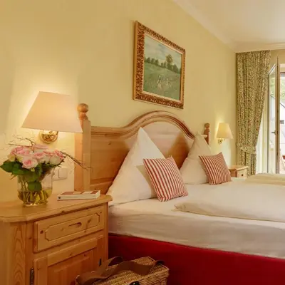 Ein Bett oder Betten in einem Zimmer der Unterkunft Ringhotel Bömers Mosel Landhotel