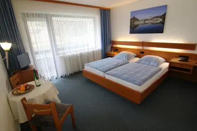 Ein Bett oder Betten in einem Zimmer der Unterkunft Hotel Klasen