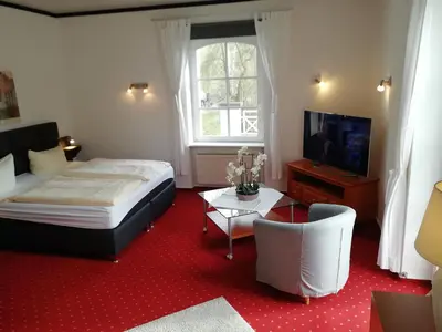 Ein Bett oder Betten in einem Zimmer der Unterkunft Waldhotel Forsthaus Remstecken