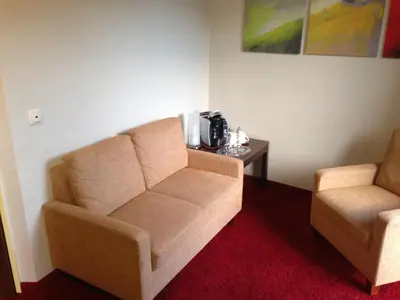 Ein Sitzbereich in der Unterkunft Rheinhotel Lamm