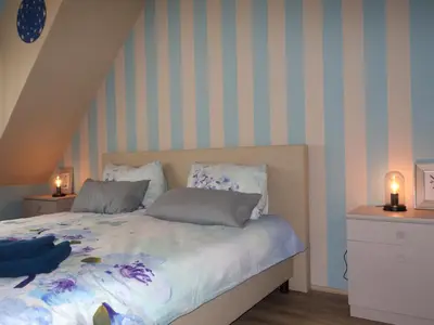 Ein Bett oder Betten in einem Zimmer der Unterkunft Mosea