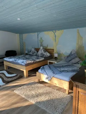 Ein Bett oder Betten in einem Zimmer der Unterkunft Gästezimmer am Waldrand
