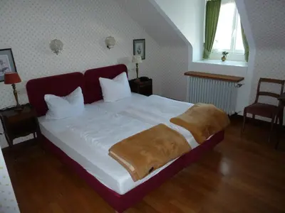 Ein Bett oder Betten in einem Zimmer der Unterkunft Hotel zum alten Brauhaus