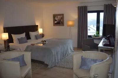 Ein Bett oder Betten in einem Zimmer der Unterkunft Landhotel Zum Kronprinzen