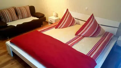 Ein Bett oder Betten in einem Zimmer der Unterkunft Apartment Koblenz