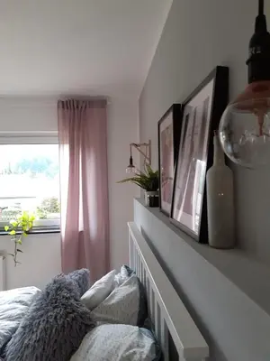 Ein Bett oder Betten in einem Zimmer der Unterkunft Moderne familienfreundliche Wohnung am Waldrand von Prüm mit Terrasse