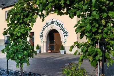 Eine Fassade oder ein Eingang zu Ferienwohnung Römerweinhof