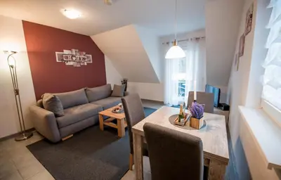 Ein Sitzbereich in der Unterkunft Haus Avallon
