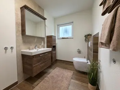 Ein Badezimmer in der Unterkunft Haus Avallon