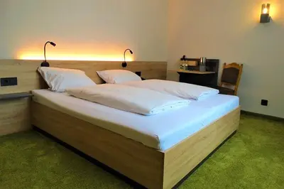 Ein Bett oder Betten in einem Zimmer der Unterkunft Hotel Sewenig