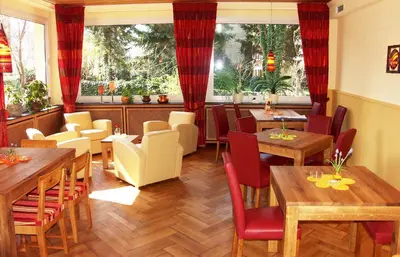 Ein Sitzbereich in der Unterkunft Hotel Zur Mühle