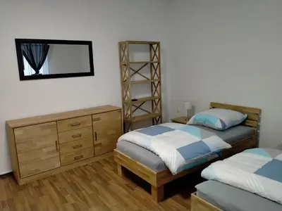 Ein Bett oder Betten in einem Zimmer der Unterkunft Ferienwohnung MacFeWo im Zentrum von Mayen - Sleep frisch renoviert