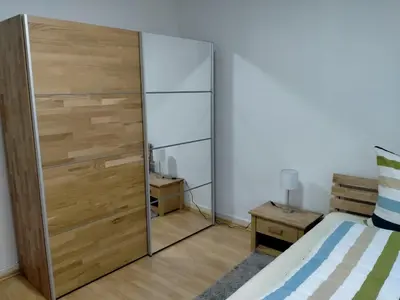 Ein Bett oder Betten in einem Zimmer der Unterkunft Ferienwohnung MacFeWo im Zentrum von Mayen - Sleep frisch renoviert