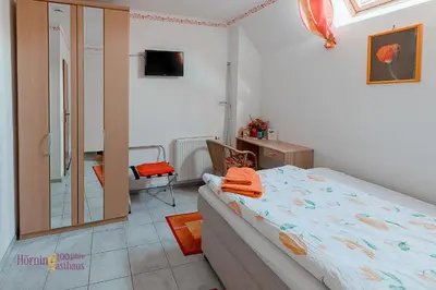 Ein Bett oder Betten in einem Zimmer der Unterkunft Ferienwohnung Hörning