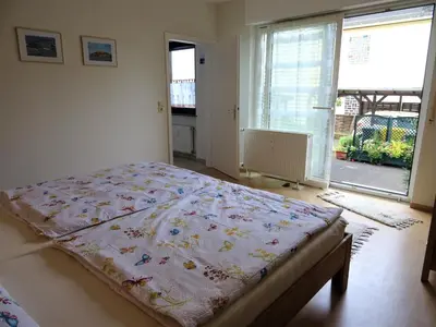 Ein Bett oder Betten in einem Zimmer der Unterkunft Ferienwohnung Rosemarie