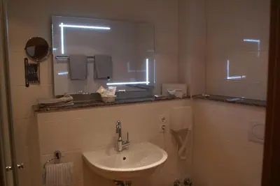 Ein Badezimmer in der Unterkunft Hotel Sonnenhof