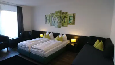 Ein Bett oder Betten in einem Zimmer der Unterkunft Hotel Deutschherrenhof