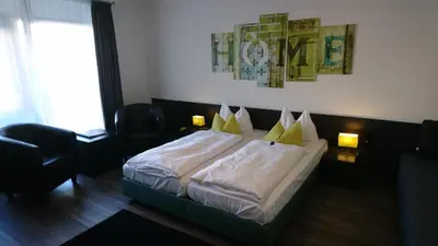 Ein Bett oder Betten in einem Zimmer der Unterkunft Hotel Deutschherrenhof