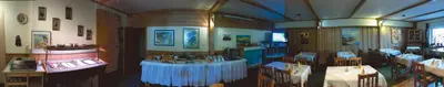 Ein Restaurant oder anderes Speiselokal in der Unterkunft Gemündener Hof
