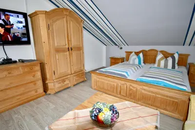 Ein Bett oder Betten in einem Zimmer der Unterkunft Gästehaus Steuer