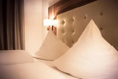Ein Bett oder Betten in einem Zimmer der Unterkunft Hotel Ehranger Hof