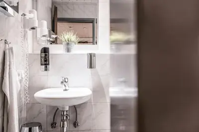 Ein Badezimmer in der Unterkunft Hotel Ehranger Hof