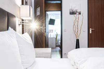 Ein Bett oder Betten in einem Zimmer der Unterkunft Hotel Ehranger Hof