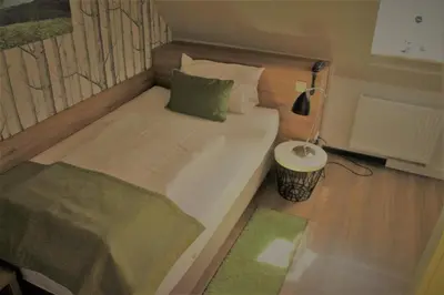 Ein Bett oder Betten in einem Zimmer der Unterkunft Hotel Eifelbräu
