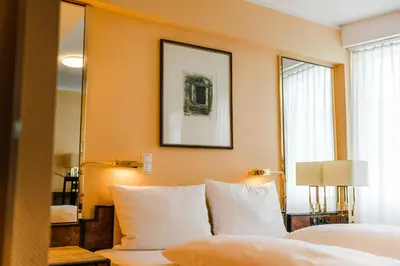 Ein Bett oder Betten in einem Zimmer der Unterkunft Hotel Rheinfels - Radfahrer Willkommen