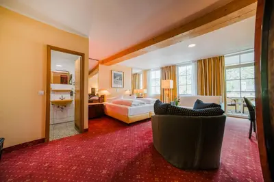 Ein Bett oder Betten in einem Zimmer der Unterkunft Hotel Rheinfels - Radfahrer Willkommen