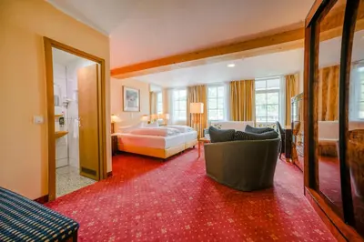 Ein Bett oder Betten in einem Zimmer der Unterkunft Hotel Rheinfels - Radfahrer Willkommen
