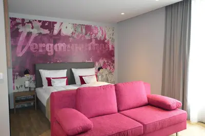 Ein Sitzbereich in der Unterkunft Boutique Hotel Moselgarten