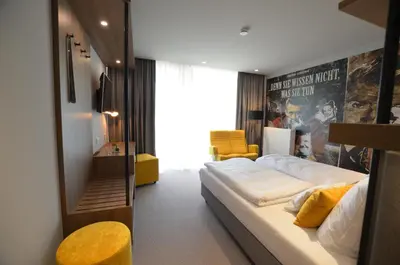 Ein Bett oder Betten in einem Zimmer der Unterkunft Boutique Hotel Moselgarten