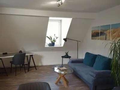 Ein Sitzbereich in der Unterkunft Gemütliche Wohnung im Zentrum, Kaffeevollautomat, Smart TV