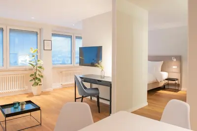 Ein Bett oder Betten in einem Zimmer der Unterkunft Apartments Trier