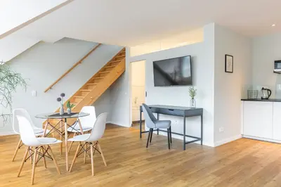 Ein Sitzbereich in der Unterkunft Apartments Trier