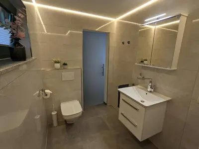 Ein Badezimmer in der Unterkunft Ferienwohnung Am Waldweg