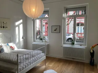 Ein Bett oder Betten in einem Zimmer der Unterkunft L11 Ferienwohnung